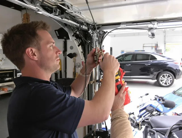 La Mirada Garage Door Repair safety certified technician performing cable replacement in La Mirada