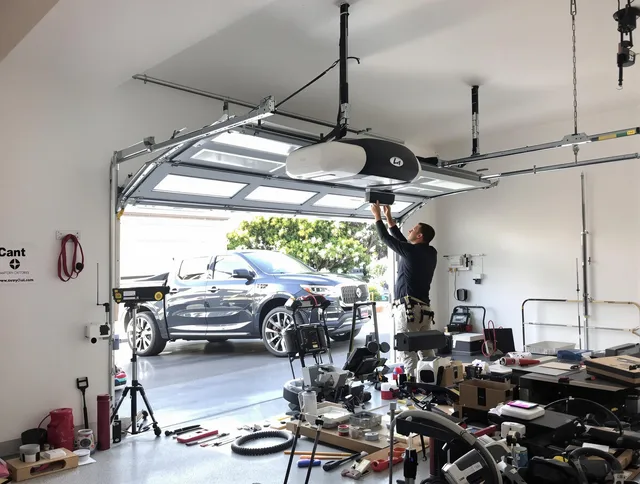 La Mirada Garage Door Repair specialist installing smart garage door opener system in La Mirada home