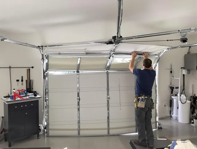 La Mirada Garage Door Repair specialist performing precise section replacement on La Mirada garage door